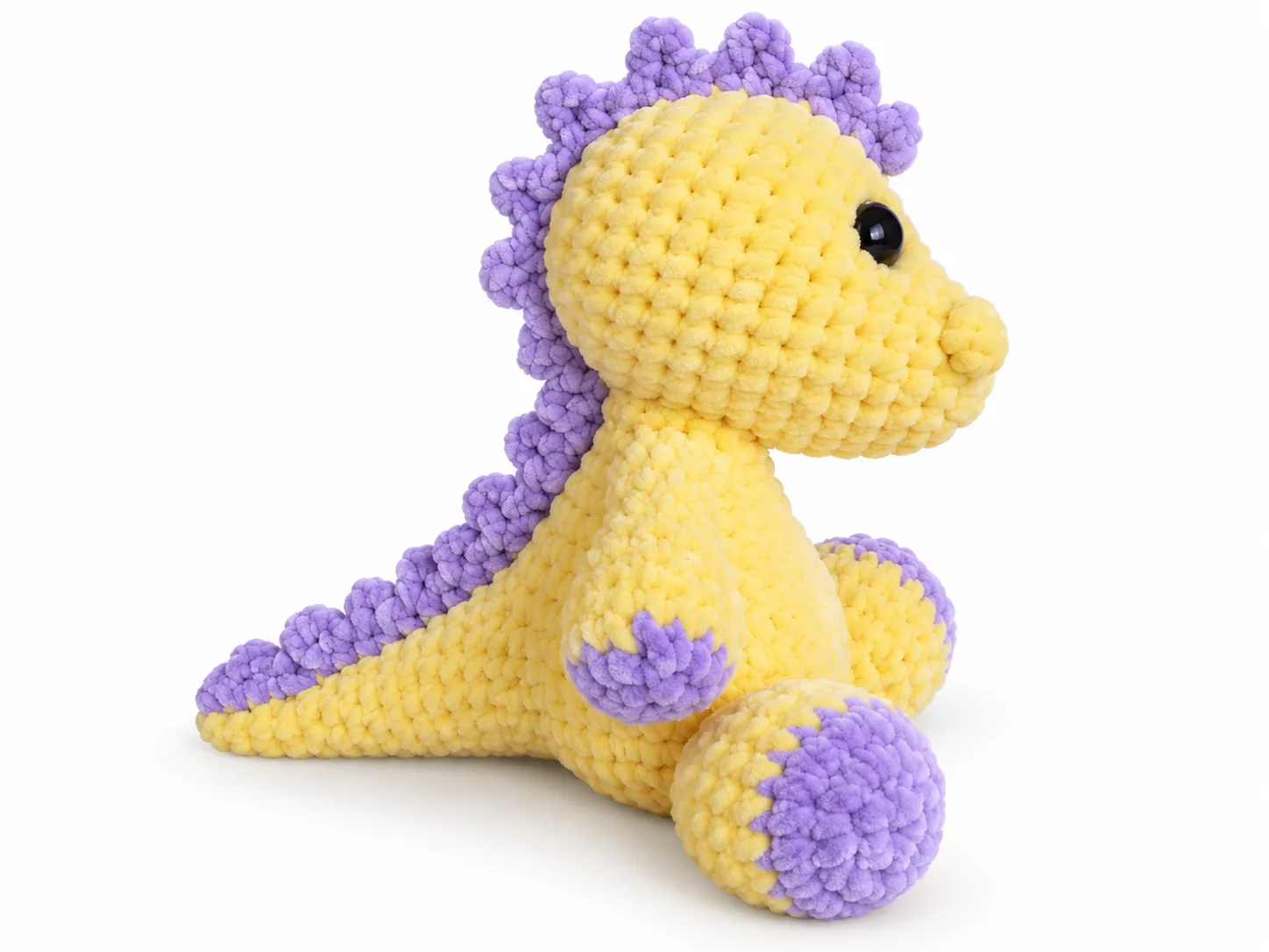 Kleine Dinosaurier in verschiedenen Farben mit runden Bäuchen und bunten Rückendetails. Ansicht 2.