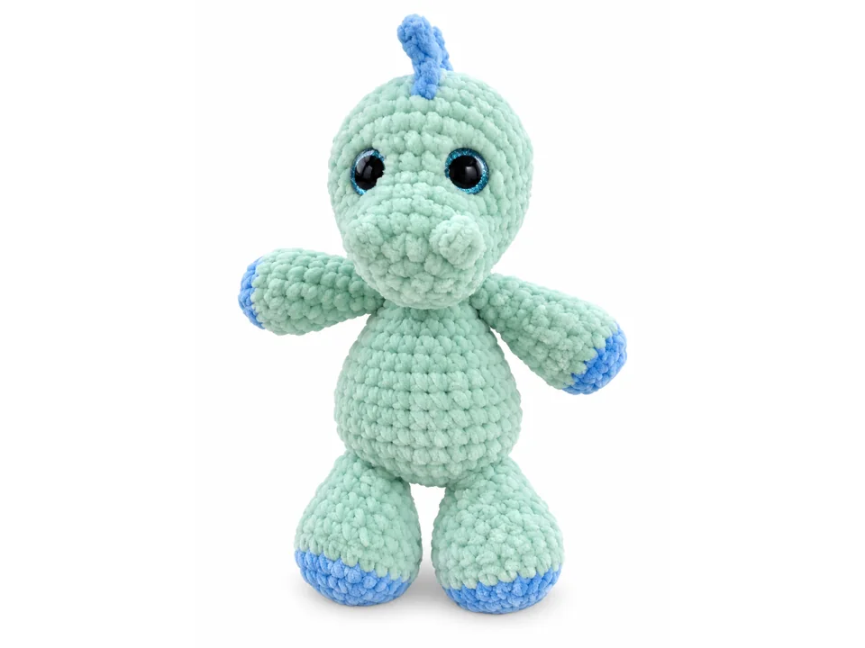 Kleine Dinosaurier in verschiedenen Farben mit runden Bäuchen und bunten Rückendetails. Ansicht 1.